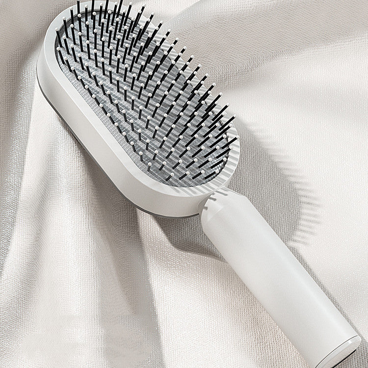 self-cleaning hair brush